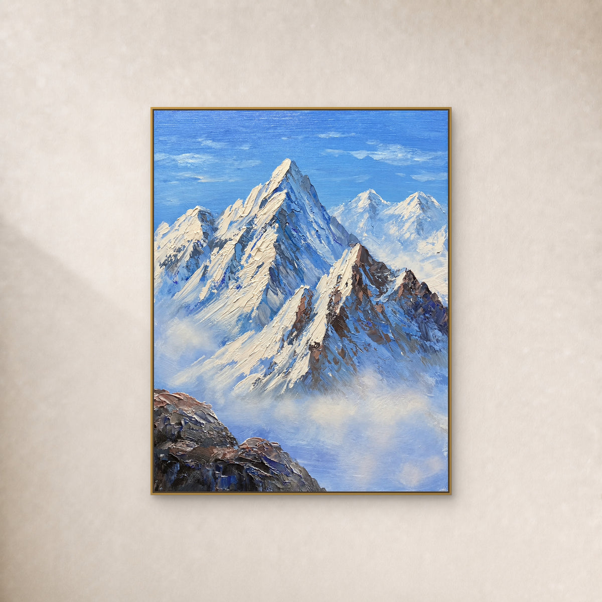 Blue Summit, a textured blue and ivory mountain painting in a slim gold floating frame