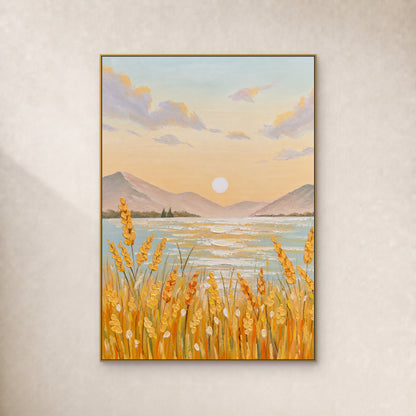 Golden grain before a blue-green lake and mauve mountains in a slim gold frame on an ivory wall