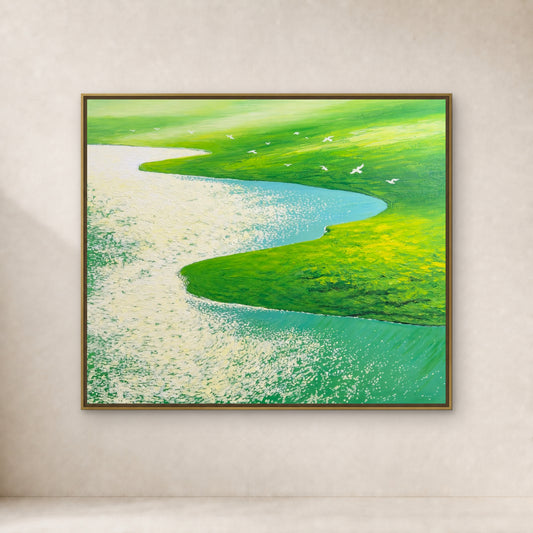 Close view of Flight Over Green Meadows in a slim gold floating frame on a warm ivory wall