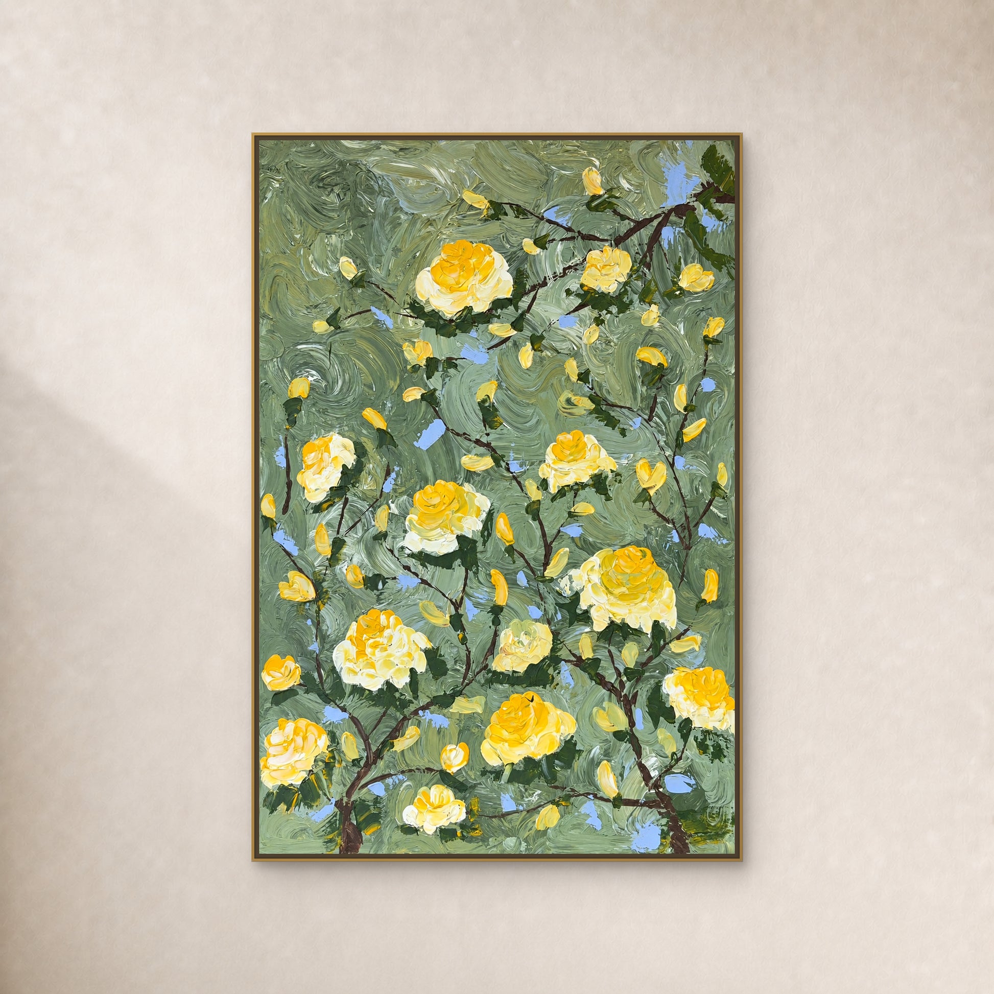 Yellow and cream rose painting on sage green in a thin gold floating frame against an ivory wall