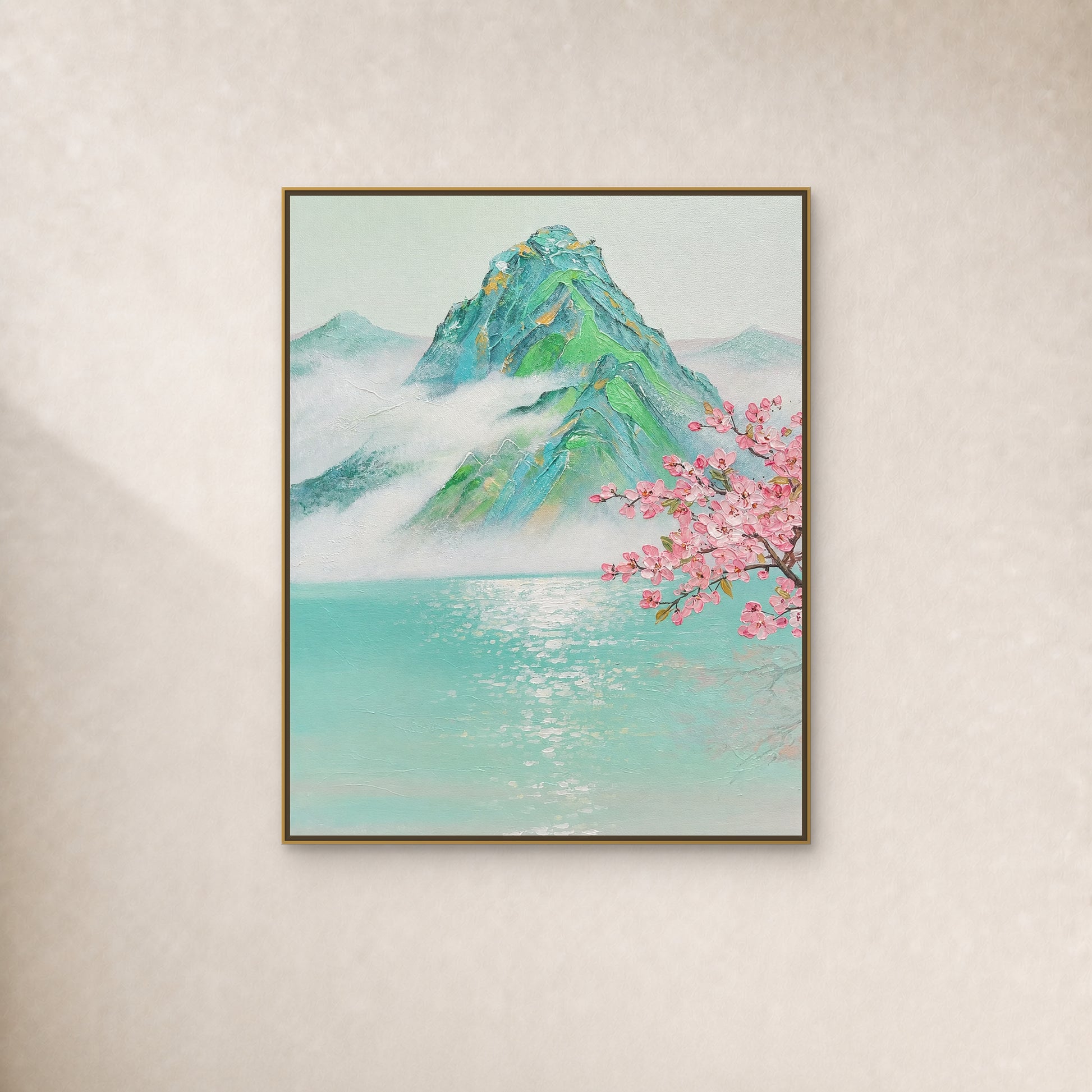 Peach Blossoms over Misty Peaks in a slim gold floating frame on a restrained warm ivory wall
