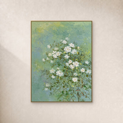White jasmine painting on a soft green field in a slim gold floating frame against an ivory wall