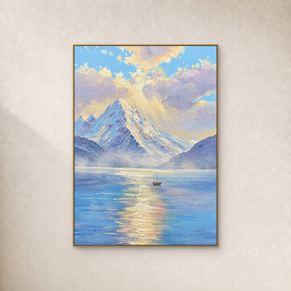 Blue mountain lake painting with morning light and a small boat, shown in a thin gold floating frame on an ivory wall