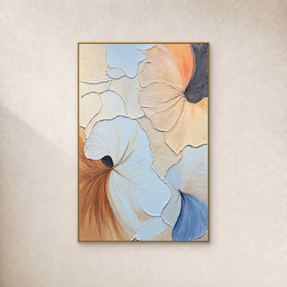 Pastel abstract with pale-blue and peach fan shapes, raised grooves and charcoal folds, in a thin gold frame on an ivory wall