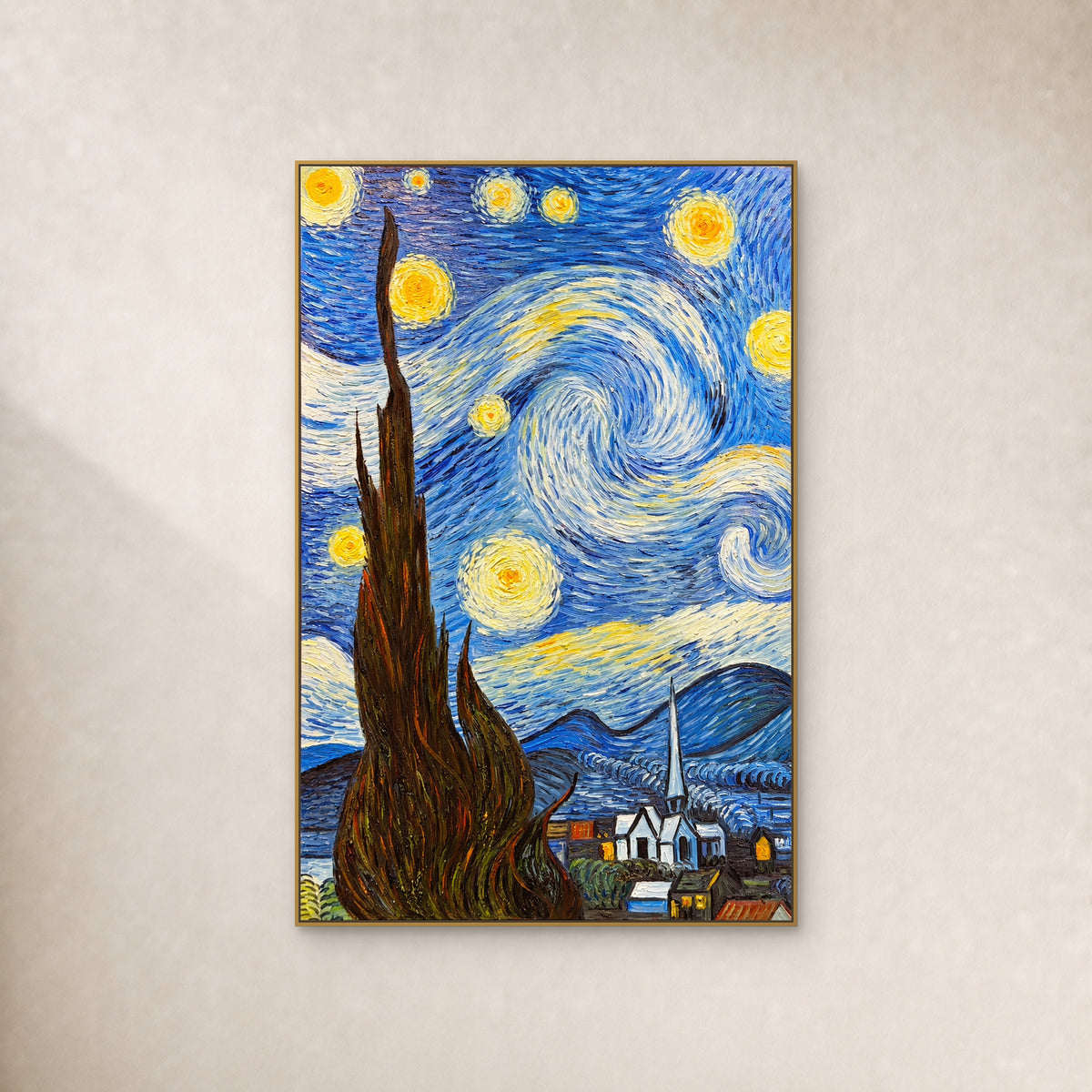 Dark cypress and yellow stars in a swirling blue sky, in a slim gold frame on an ivory wall