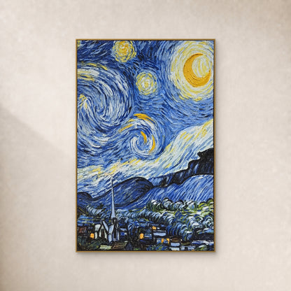 Blue and white sky swirls around a yellow crescent above a village, in a slim gold frame on a plain ivory wall.