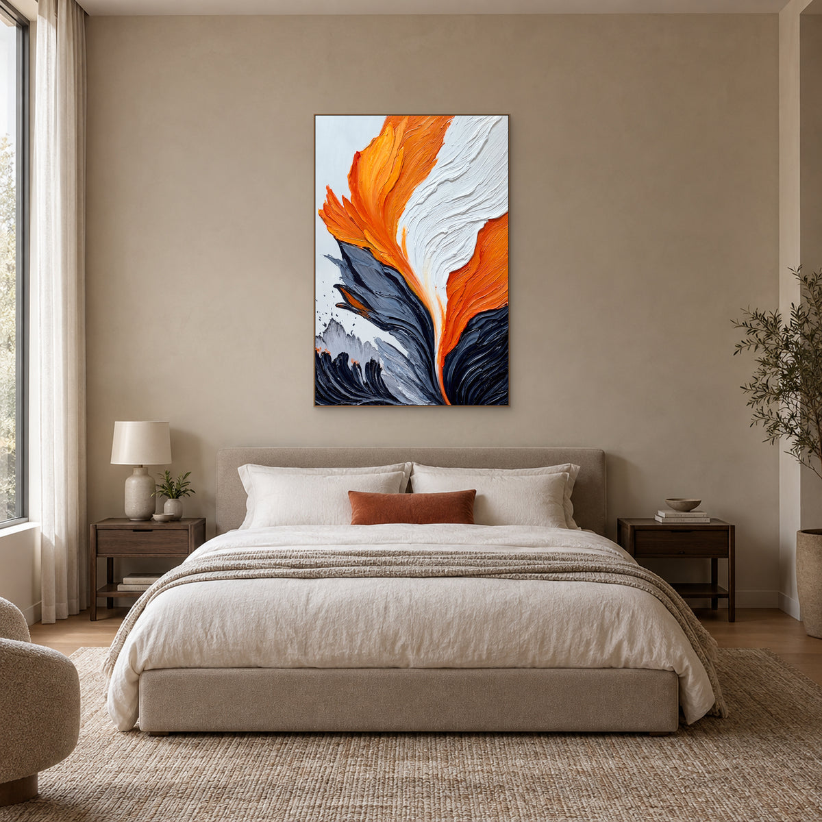 Vertical orange and white abstract painting in an oak-tone frame centred above an upholstered bed