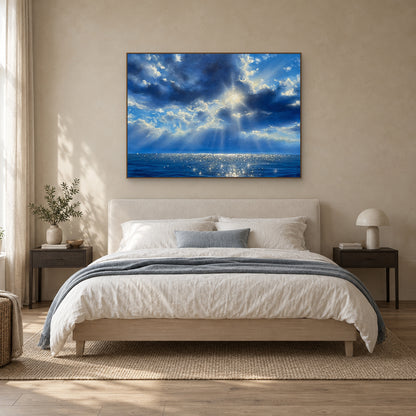 Blue Reverie in a slim oak-look frame centred above a cream upholstered headboard.