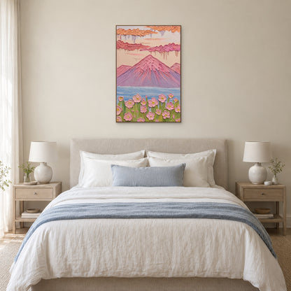 Pastel mountain and flower painting in an oak-tone frame centred above an upholstered bed