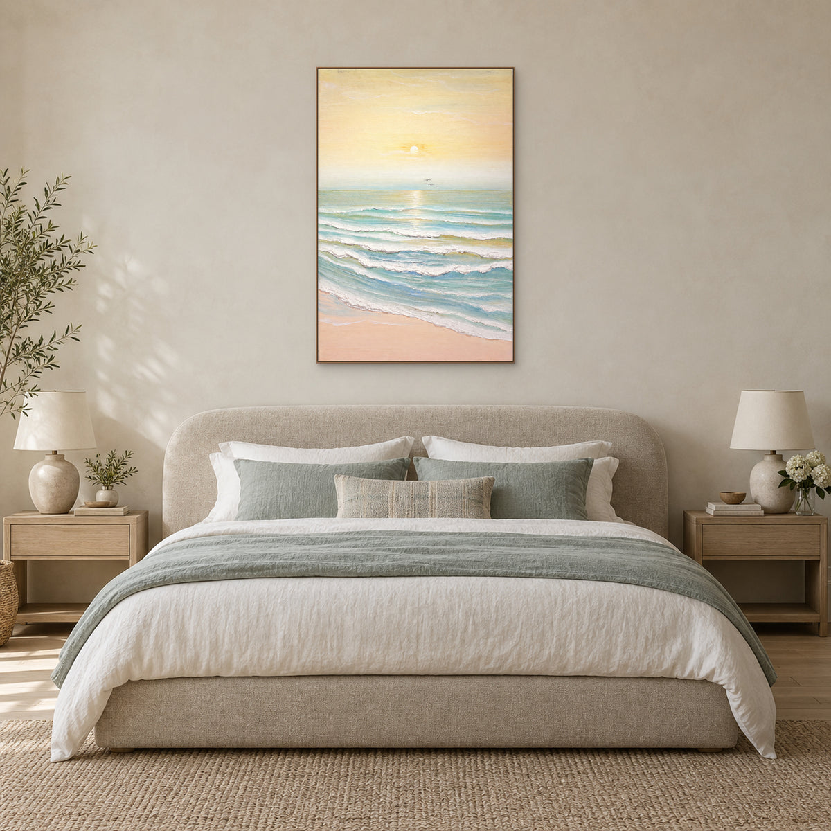 Morning Tide pastel sunrise painting in an oak-tone floating frame centred above a linen bed
