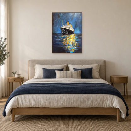 Blue and gold ship painting in an oak-toned floating frame centred above a linen headboard and navy bedding