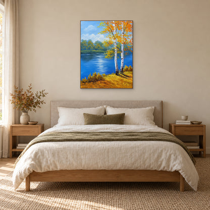Vertical autumn birch painting in an oak-toned frame centred above a bed
