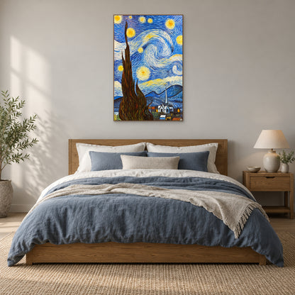 Vertical starry cypress painting in an oak-tone frame above a wooden headboard and slate-blue bedding