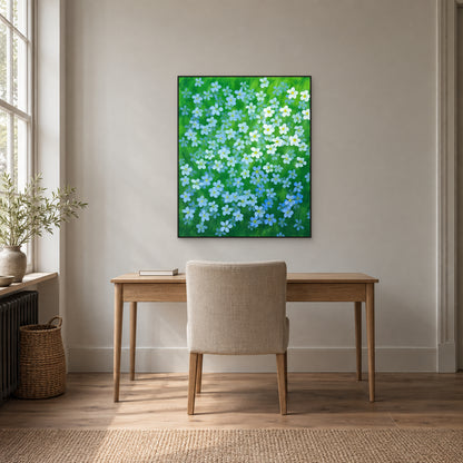 Blue flax botanical wall art in a black floating frame above a calm office desk