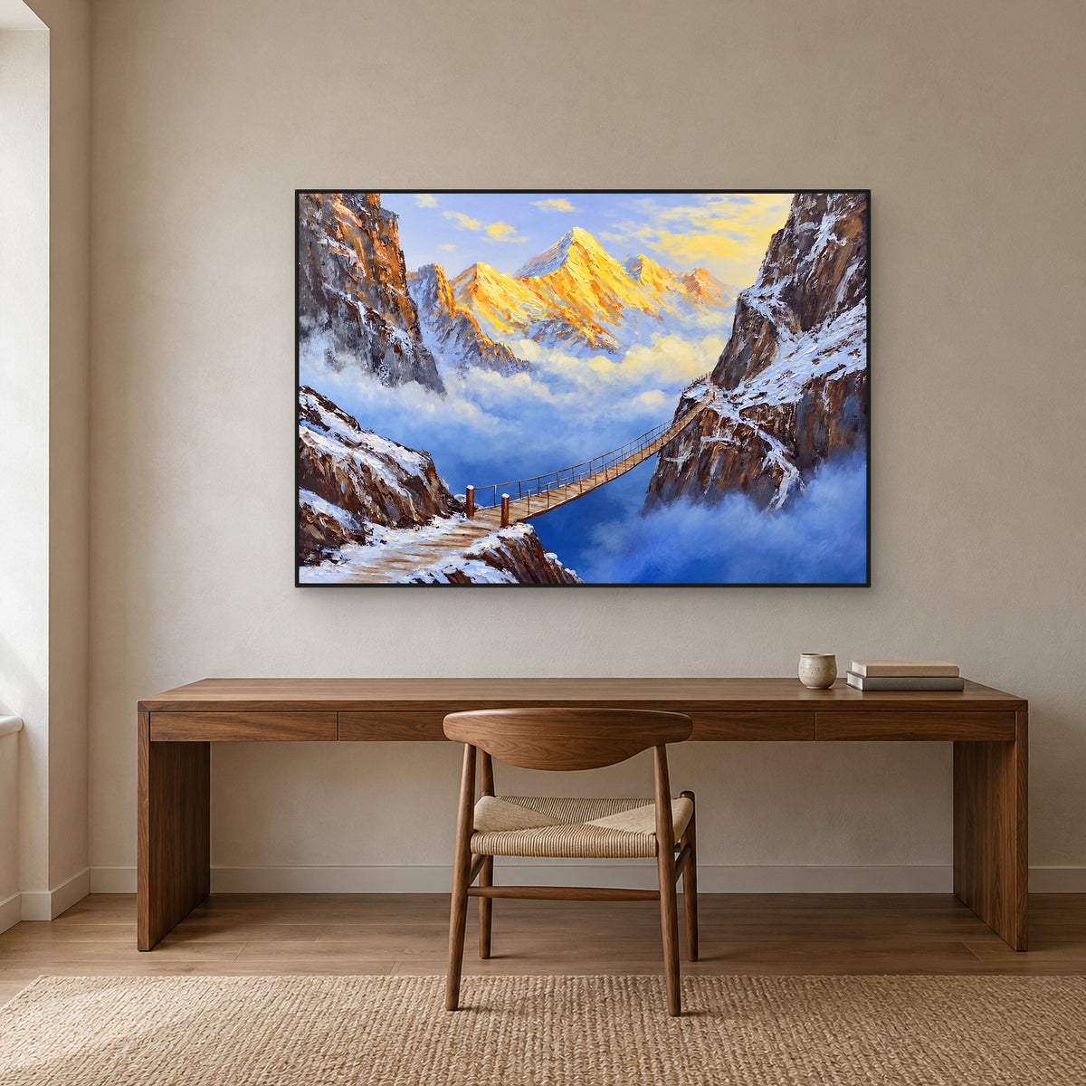 Golden peaks and blue canyon artwork in a black frame above a walnut desk