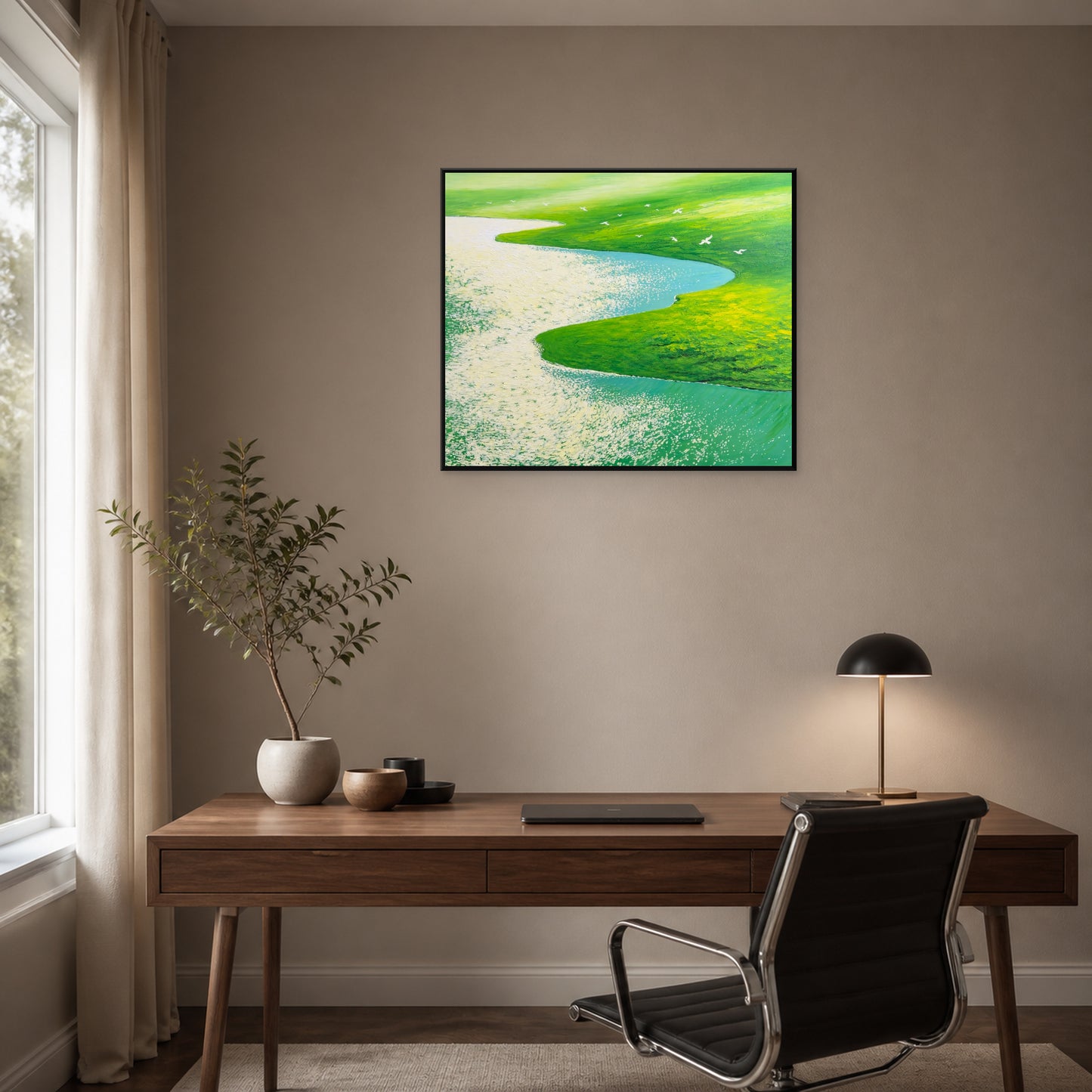 Flight Over Green Meadows in a slim black floating frame above a walnut home office desk