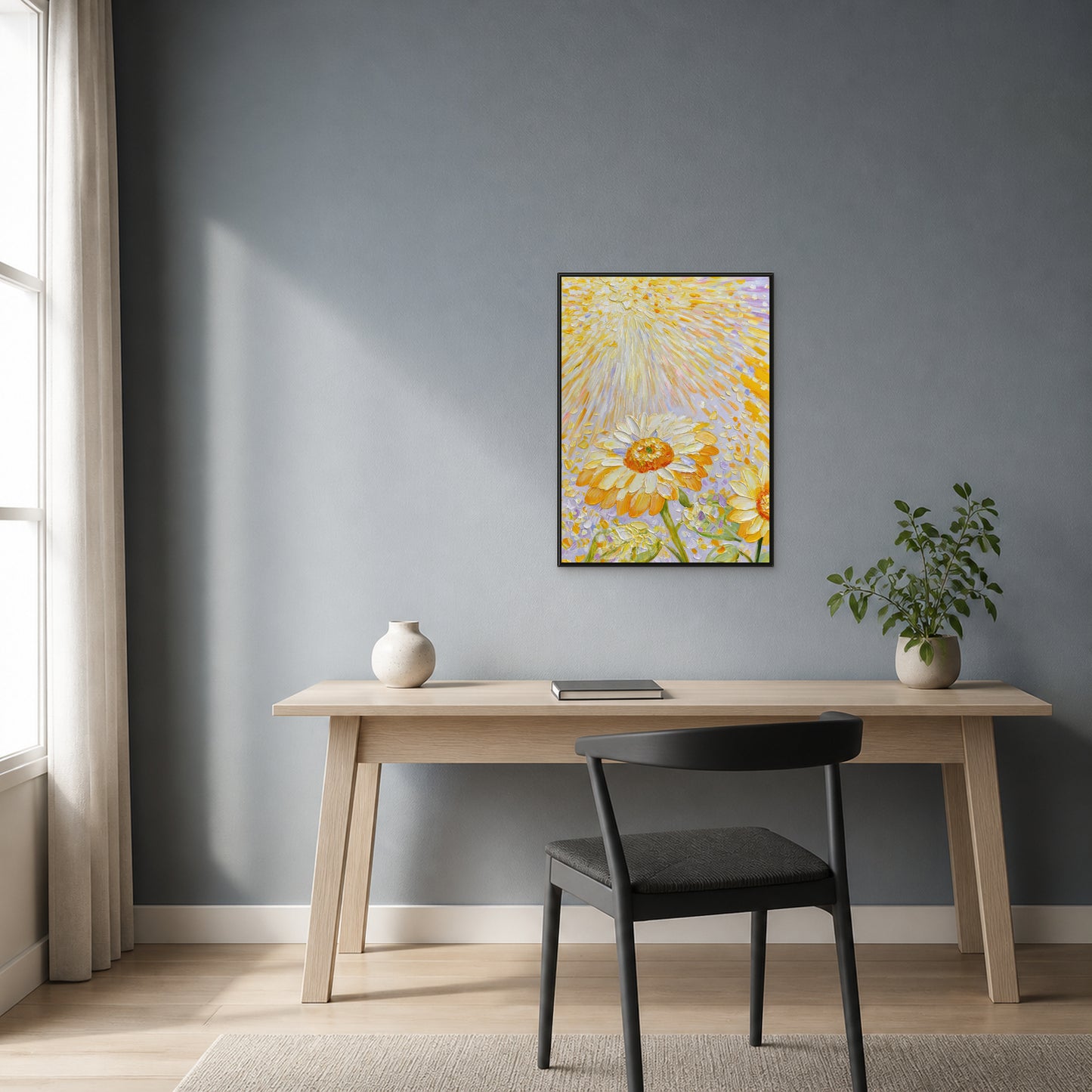 Sunflowers in Golden Light in a slim black floating frame centred above an ash-wood desk on a dusty blue-grey wall