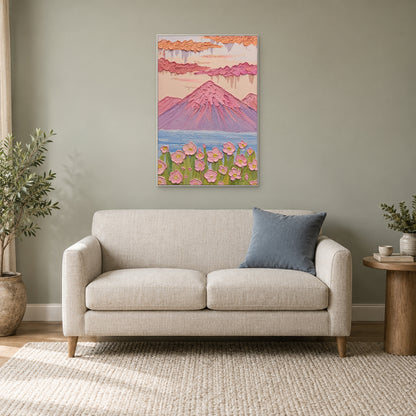 Raised pink flowers and a lilac peak in a white frame above a cream loveseat in a reading corner