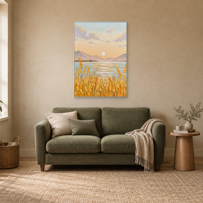 Golden grain and pastel lake painting in a white frame above a moss-green loveseat