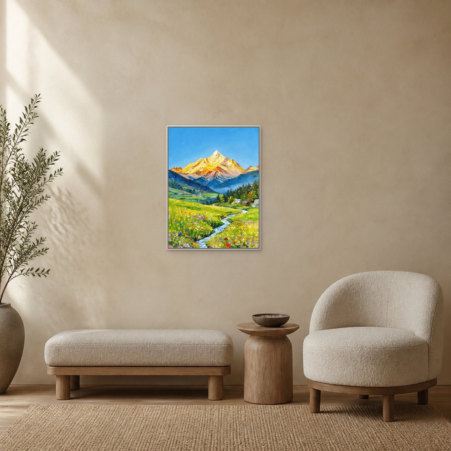 Spring Beneath the Golden Mountain in a slim white floating frame above an oat bench beside a rounded reading chair