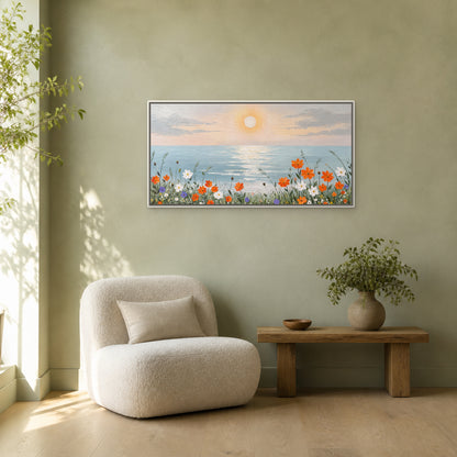 Coastal Bloom at Sunrise in a slim white floating frame above a cream chair and low oak bench on a sage wall