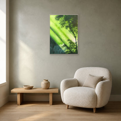 Forest Light in a slim white floating frame above an oak bench beside an ivory reading chair