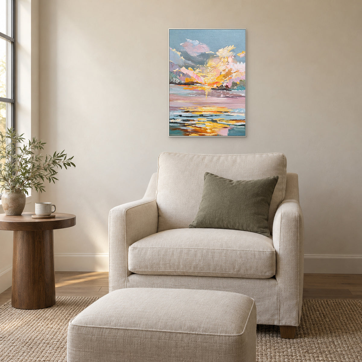 Rose-lit Water in a thin white frame above an ivory reading chair