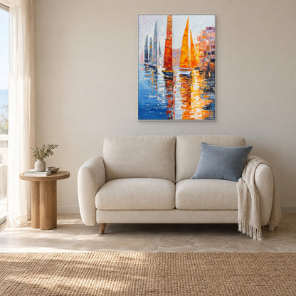 Orange sailboat painting in a white floating frame above a cream loveseat