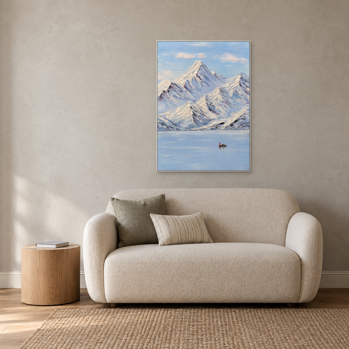 Snow Peaks, Still Lake in a white floating frame above a cream loveseat beside a sunlit window