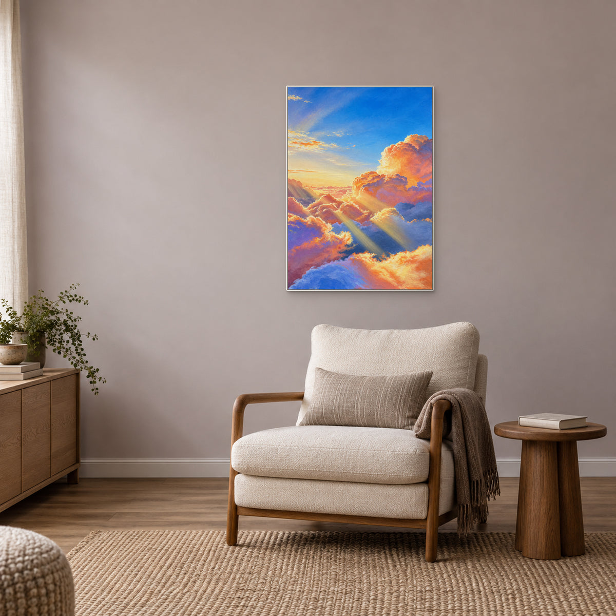 Sunlit cloud artwork in a thin white floating frame above a cream lounge chair in a warm reading corner