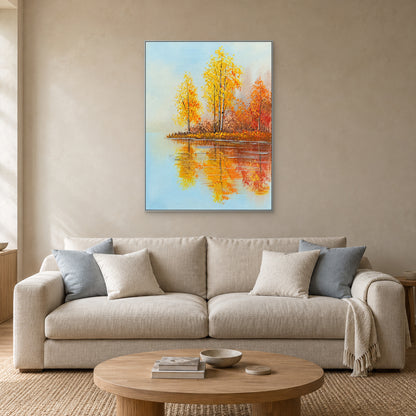 Vertical golden birch lake painting with a silver-tone frame above an oatmeal sofa and blue-grey cushions