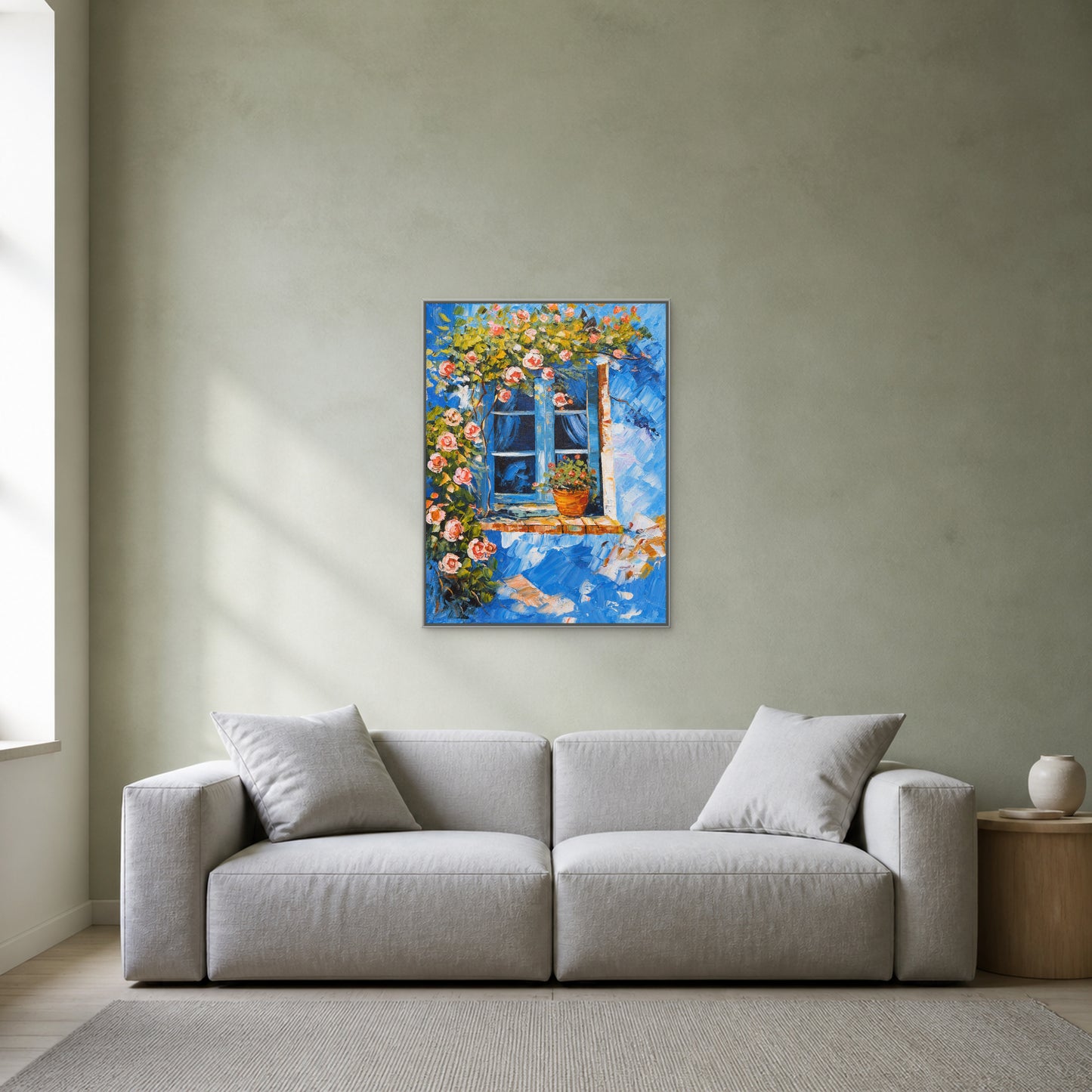 Blue Window in Bloom in a slim silver floating frame above a light neutral living room sofa
