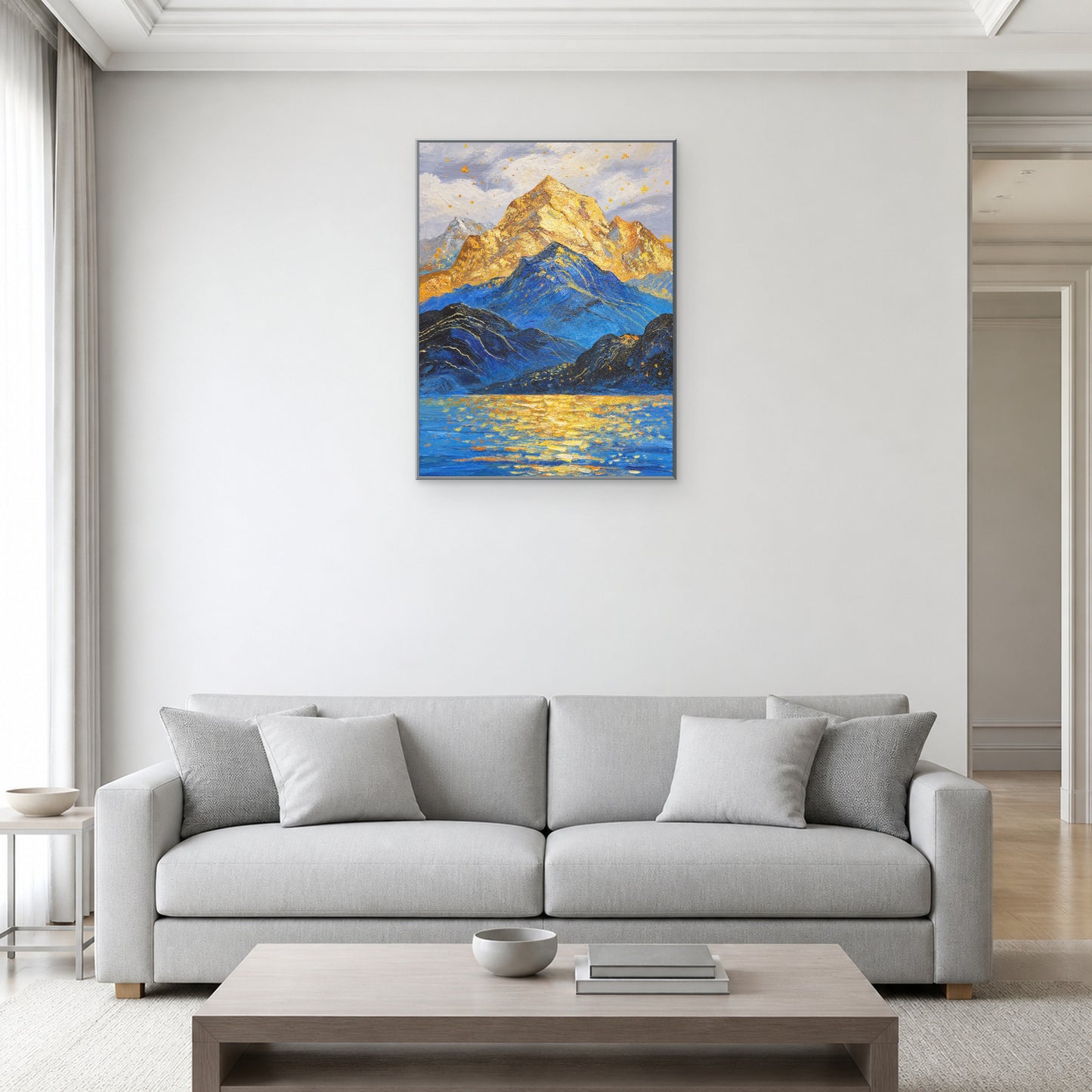 Golden Summit in a slim silver floating frame above a light grey living room sofa