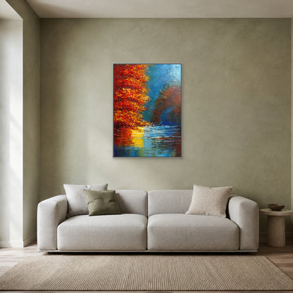 Vertical autumn landscape in a slim silver floating frame centred above a pale grey sofa