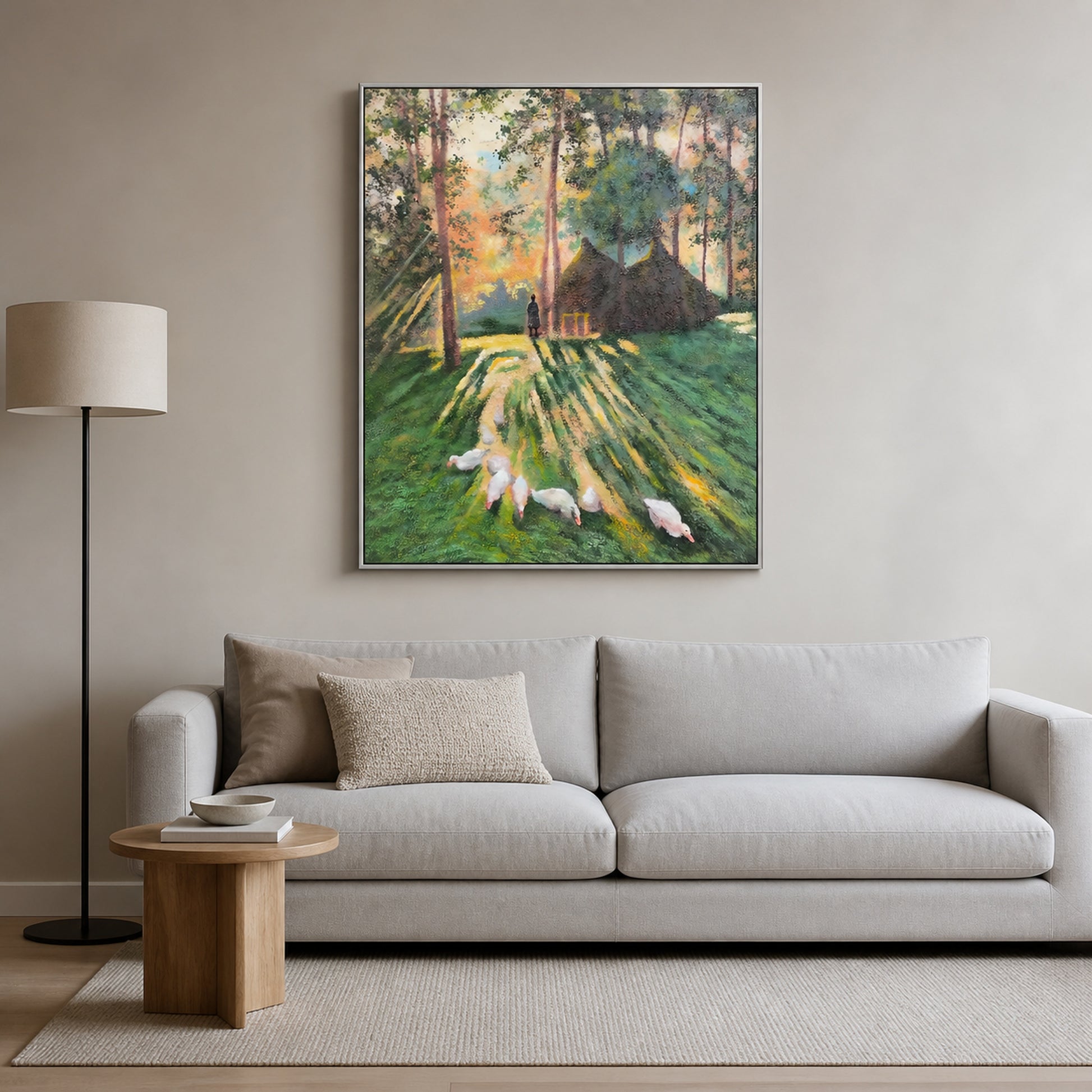 Woodland Morning in a slim silver floating frame above a light grey living room sofa