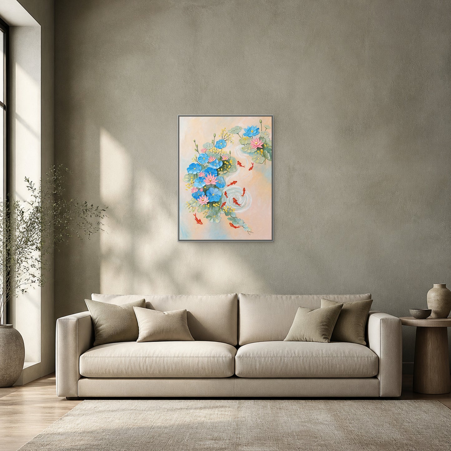 Nine Koi and Lotus in a slim silver floating frame above an ivory sofa on a sage-grey wall