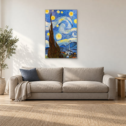 Tall cypress and swirling night sky in a silver-tone frame above a light sofa with a blue cushion