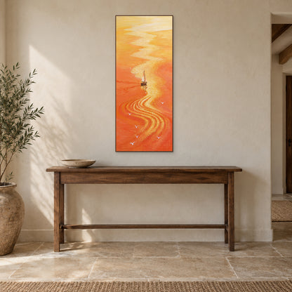 Tall sailboat painting in a walnut-tone frame above a wooden entryway console with a shallow bowl