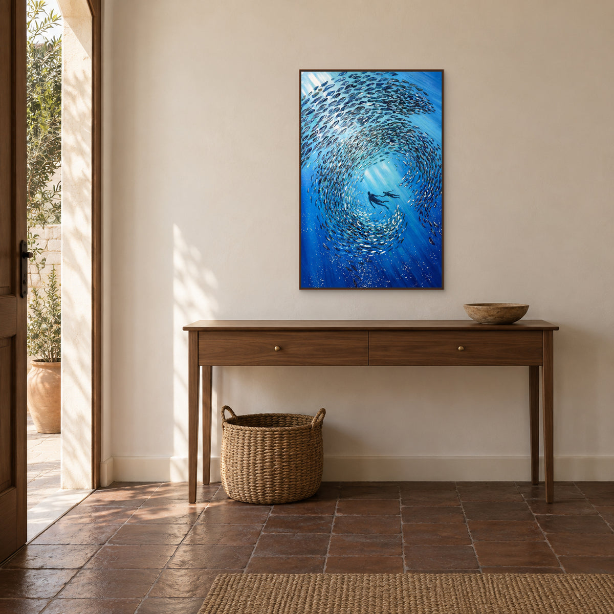 Within the Shoal painting in a walnut-toned floating frame centred above a two-drawer entryway console