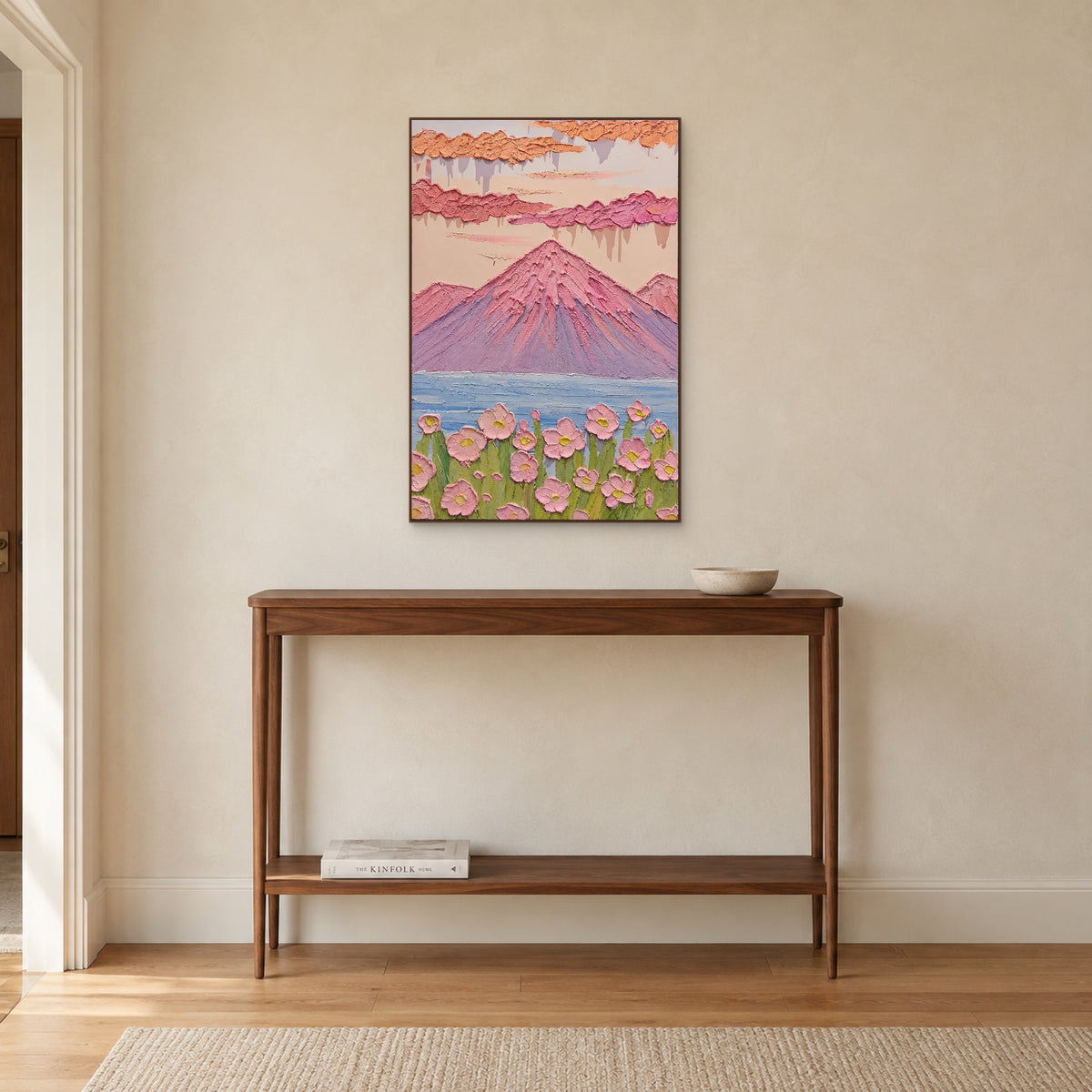 Blush Alpine Garden in a walnut-tone frame above a narrow wooden entryway console