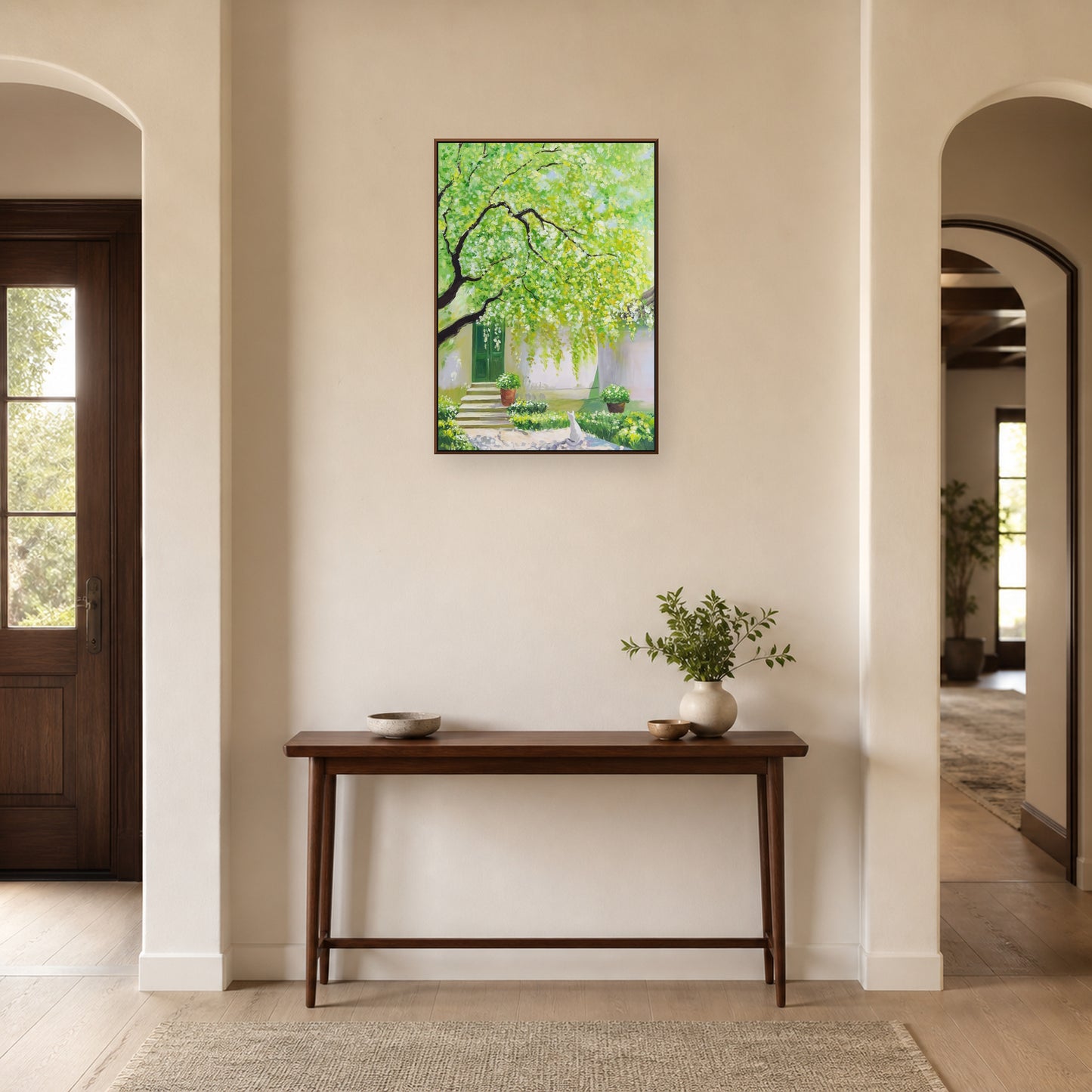 Spring Courtyard in a slim walnut floating frame above a wood entryway console
