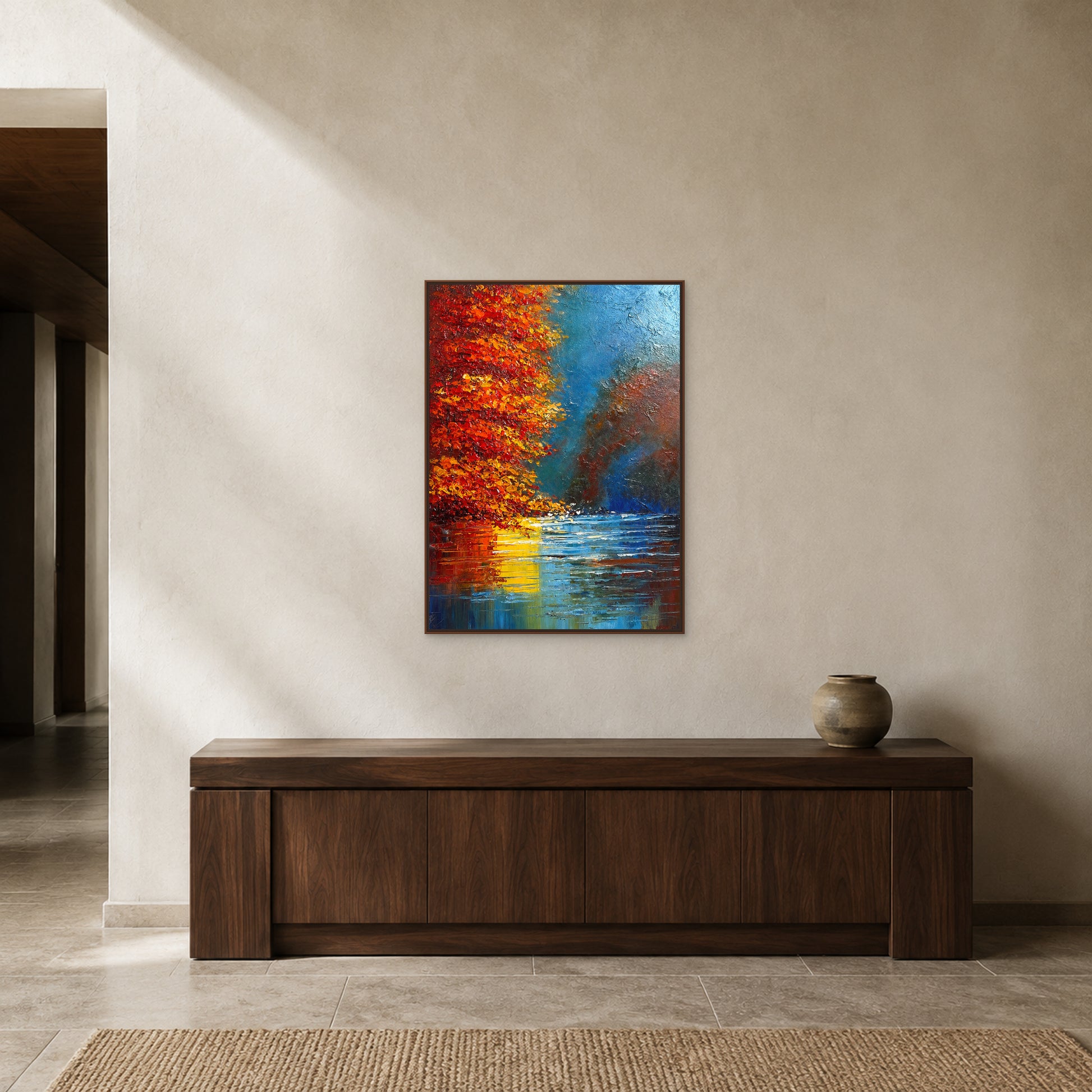 Red autumn tree painting in a slim walnut floating frame above an entryway console