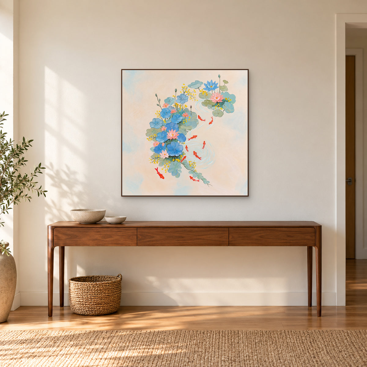 Pastel lotus pond painting in a walnut-toned frame above a wooden entryway console