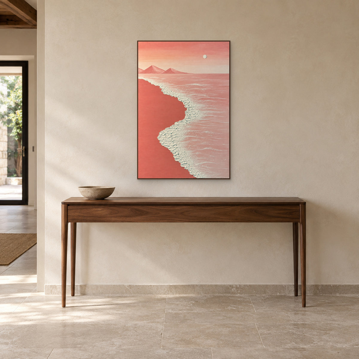 Pink Shore in a walnut-look floating frame above a narrow entryway console