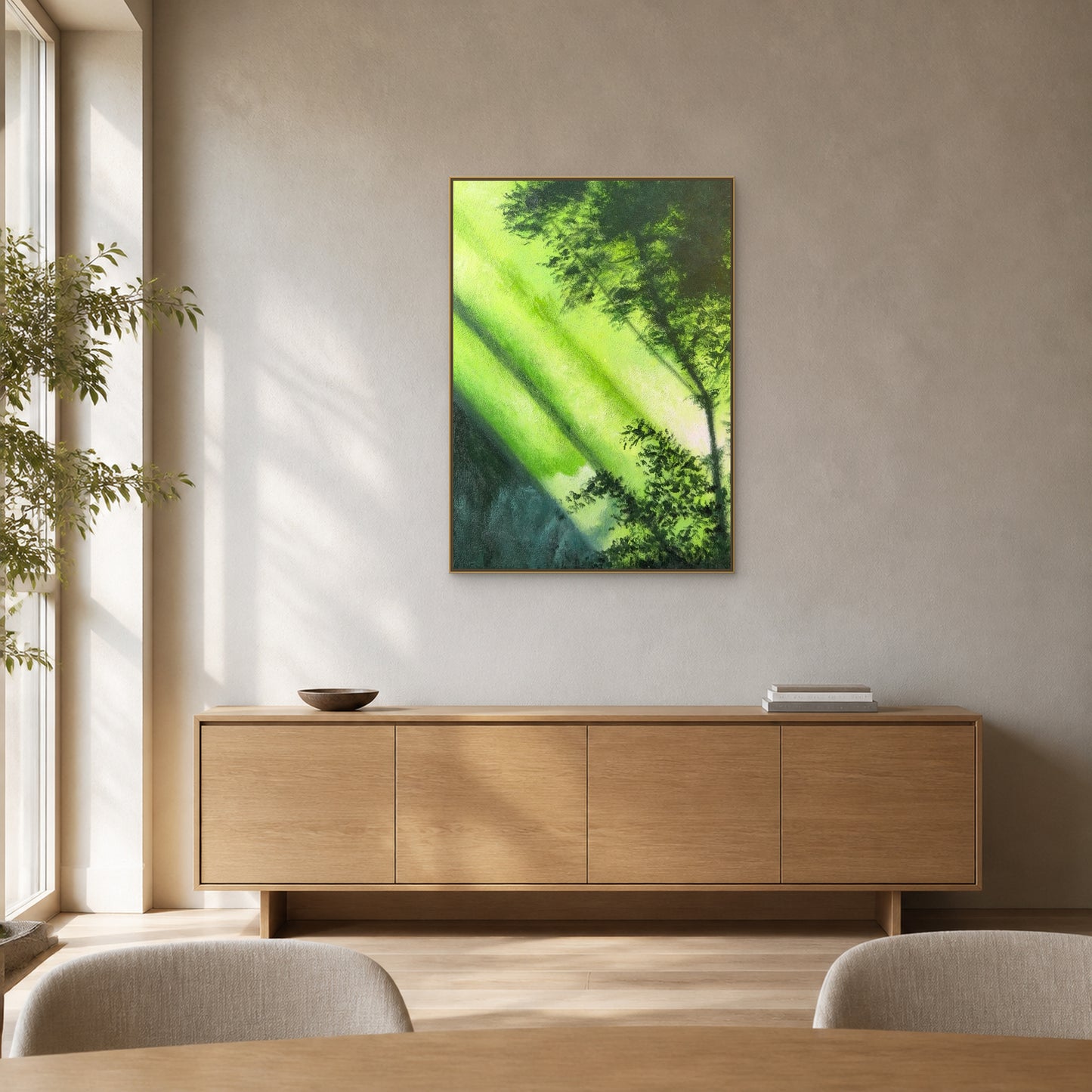 Forest Light in a slim champagne floating frame above a pale oak dining sideboard