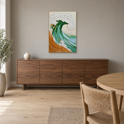 Green wave and white foam painting in a champagne-tone frame over a wooden dining-room sideboard