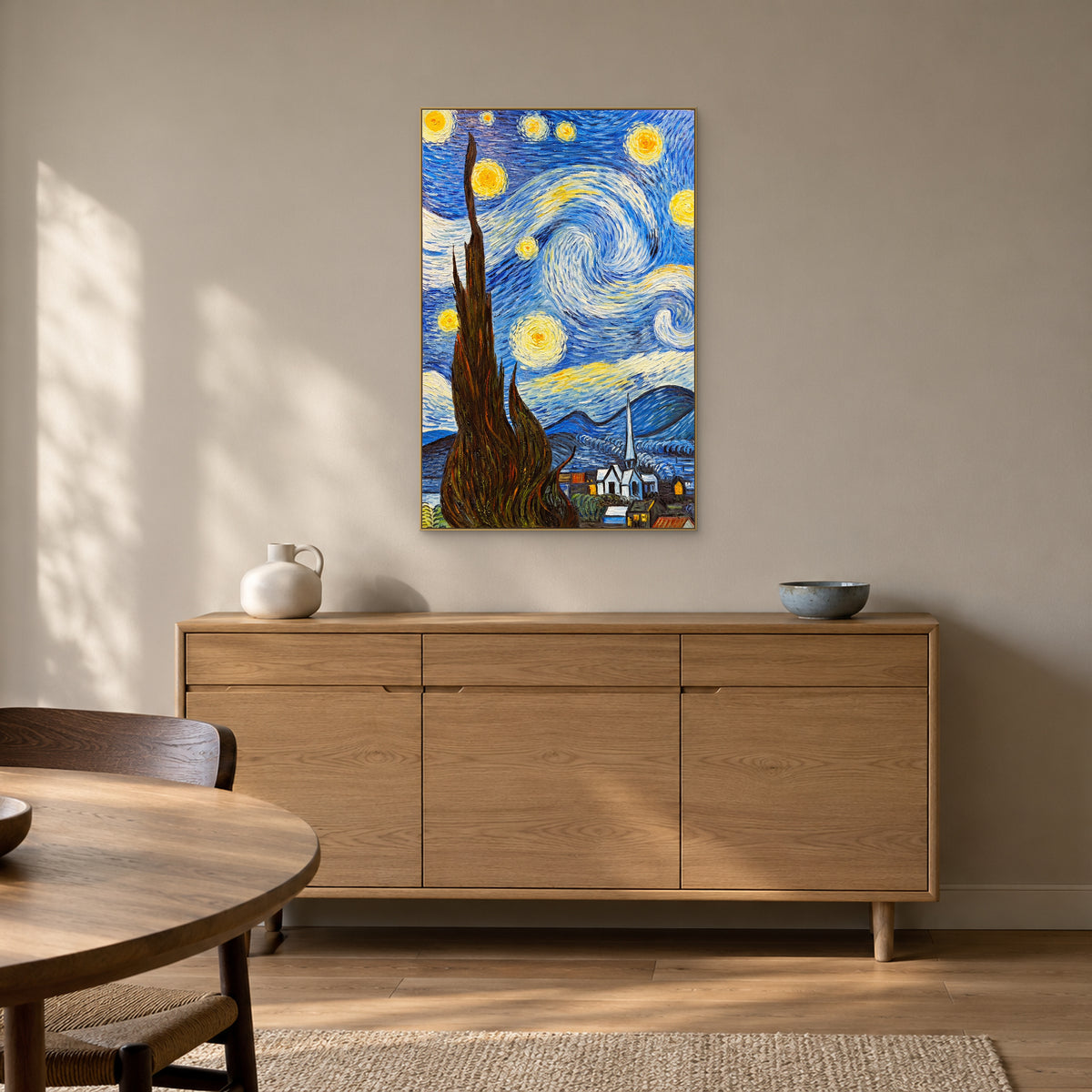 Blue and yellow starry cypress painting in a champagne-tone frame above an oak dining-room sideboard