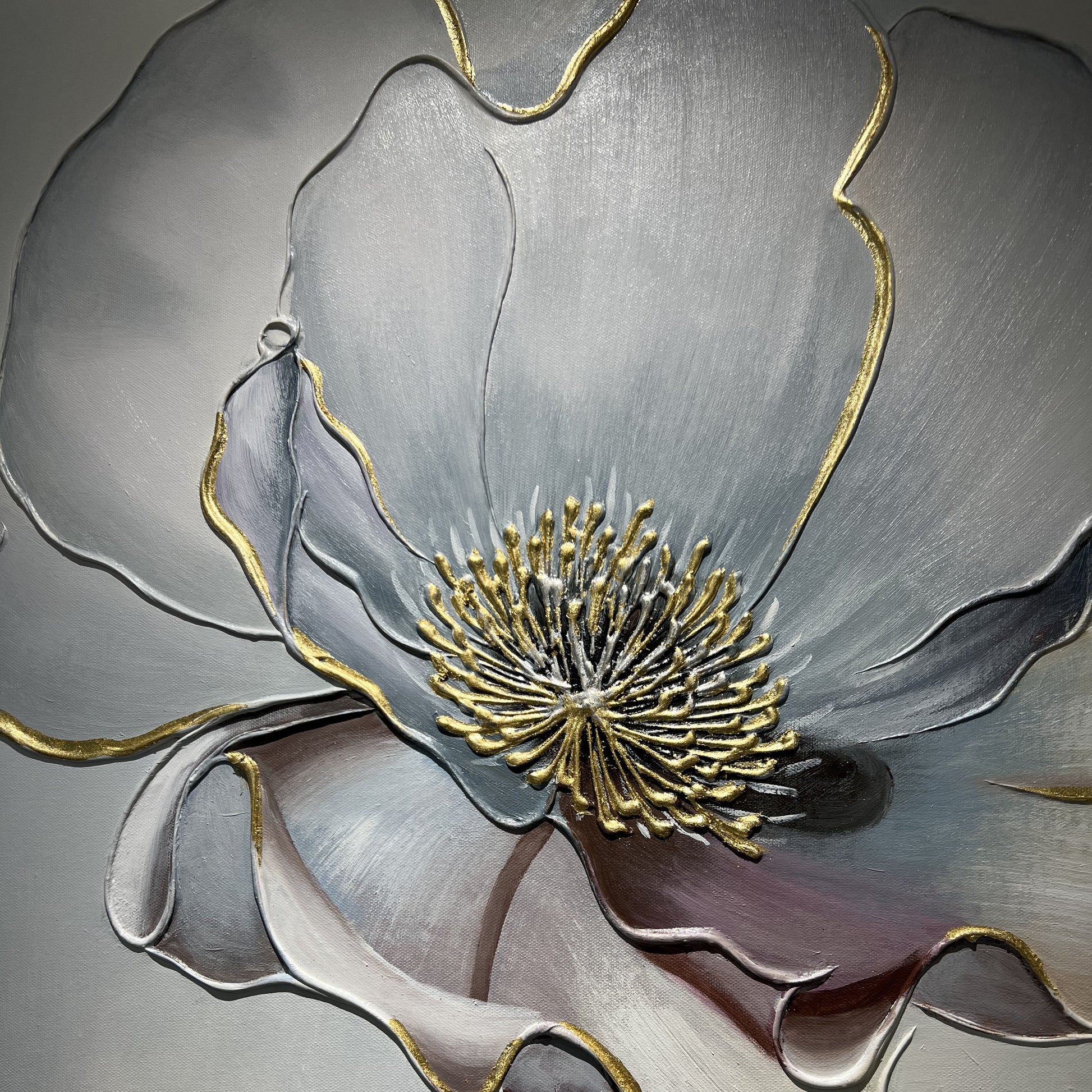 Macro view of Aurelian Silence gold-toned flower center and outline