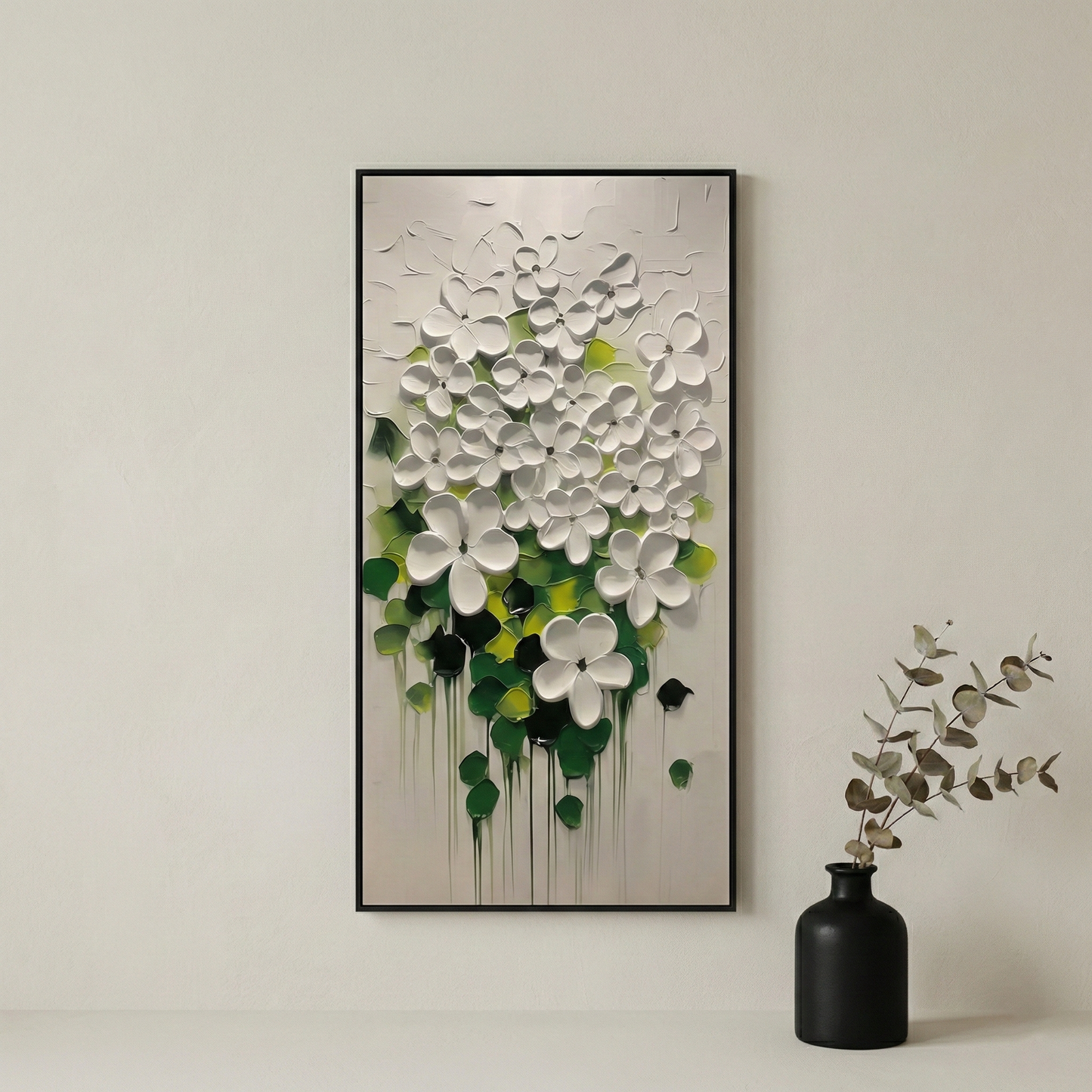 Lumina Sculpted Flora beside a black vase in a light living space