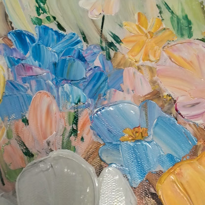 Close view of Aurelia blue, blush and yellow raised flower petals